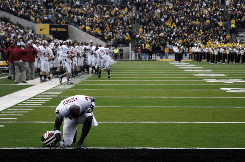 IU cornerback Ray Fisher prays in the end zone before a football game on Saturday, Oct. 31, 2009, in Iowa City, Iowa.