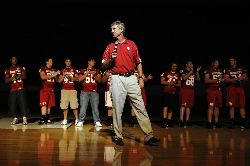 Flanked by freshmen football players, IU football coach Bill Lynch talks to students during Traditions and Spirit of IU on Friday, Aug. 28, 2009 at Assembly Hall.