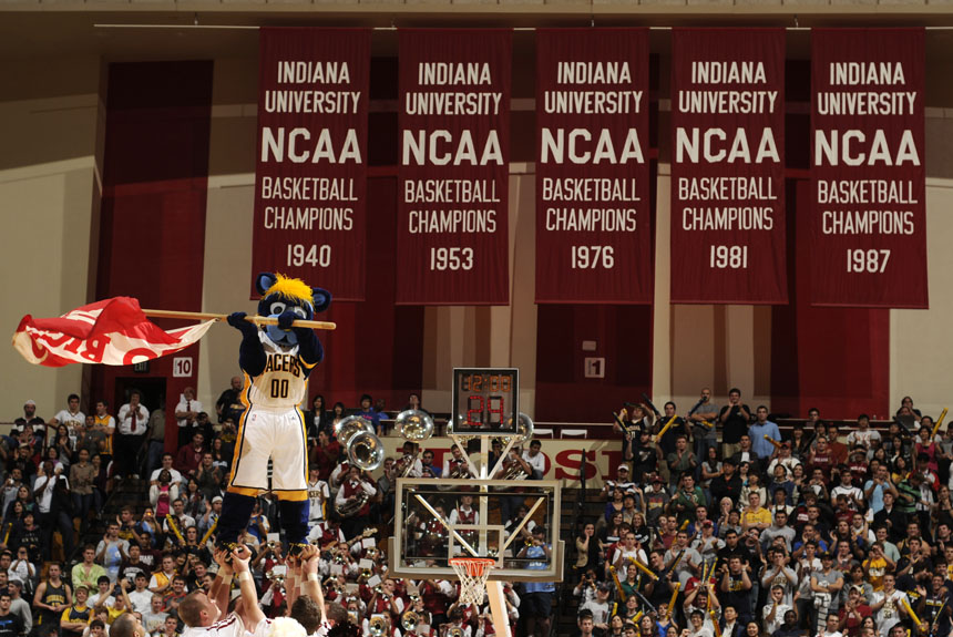 Boomer waves an Indiana University flag as he performs with IU cheerleaders during a preseason NBA game between the Pacers and Spurs on Friday, Oct. 23, 2009, at Assembly Hall in Bloomington, Ind. Indiana won 114-112.