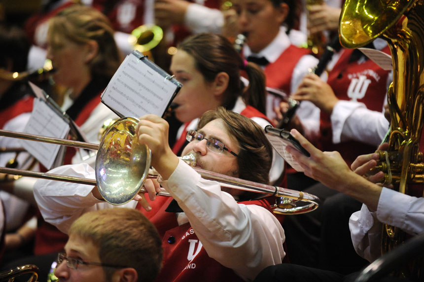 A member of the IU Marching Hundred performs during a game against Cincinnati on Wednesday, Nov. 18, 2009, at Assembly Hall.