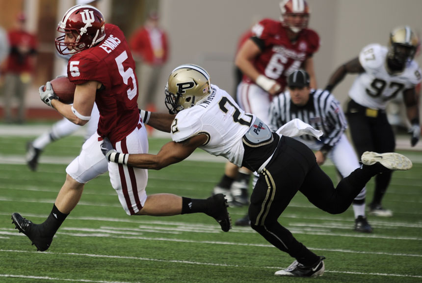 IU wide receiver Mitchell Evans hauls in a catch as Purdue safety Torri Williams tries to make a tackle during a game on Saturday, Nov. 21, 2009, at Memorial Stadium.