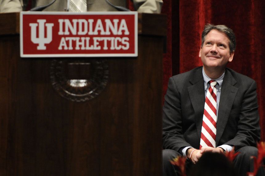 Indiana Athletics Director Fred Glass smiles as he listens to former basketball player Steve Downing speak during the Indiana University Athletics Hall of Fame induction ceremony on Friday, Nov. 6, 2009, at Assembly Hall in Bloomington, Ind.
