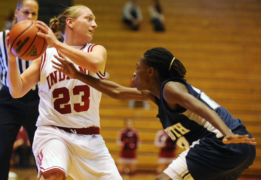 IU guard Jamie Braun surveys the defense as a Lambuth player tries to knock the ball away during an exhibition game on Sunday, Nov. 1, 2009, at Assembly Hall. IU won 108-54.
