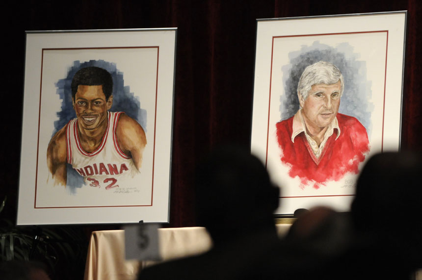 Portraits of former Indiana coach Bob Knight, right, and former player Steve Downing sit on display during the Indiana University Athletics Hall of Fame induction ceremony on Friday, Nov. 6, 2009, at Assembly Hall in Bloomington, Ind.