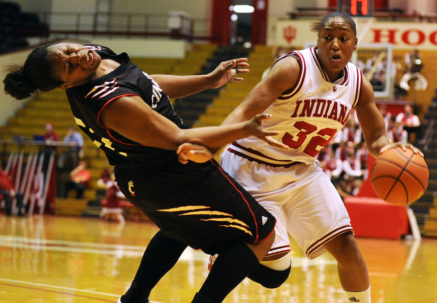 IU guard Jori Davis makes contact with Cincinnati forward Michelle Jones during a game on Wednesday, Nov. 18, 2009, at Assembly Hall.