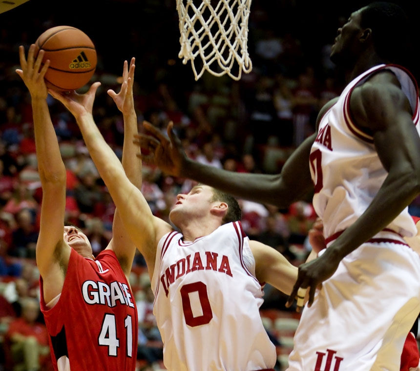 Grace guard Jay Hinkel knocks the ball away from IU guard Kory Barnett during an exhibition game on Wednesday, Nov. 4, 2009, at Assembly Hall.