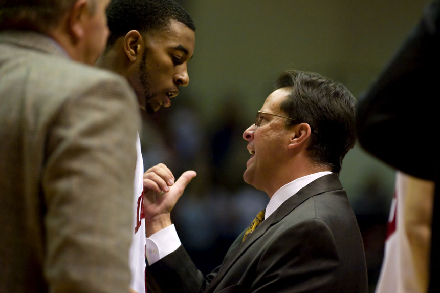 Indiana coach Tom Crean speaks to IU forward Christian Watford during a timeout during an exhibition game against Grace on Wednesday, Nov. 4, 2009, at Assembly Hall.