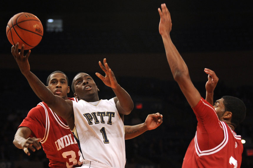 Pittsburgh guard Travon Woodall (1) puts up a shot in front of IU guard Devan Dumes and guard Maurice Creek during the Jimmy V Classic on Tuesday, Dec. 8, 2009, at Madison Square Garden in New York.