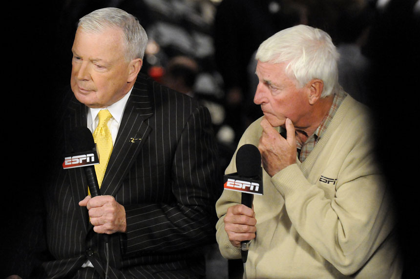 ESPN commentator Bob Knight, right, listens to a co-host during an on-air segment before the IU-Pittsburgh game in the Jimmy V Classic on Tuesday, Dec. 8, 2009, at Madison Square Garden in New York. Knight watched his former team from above the court.