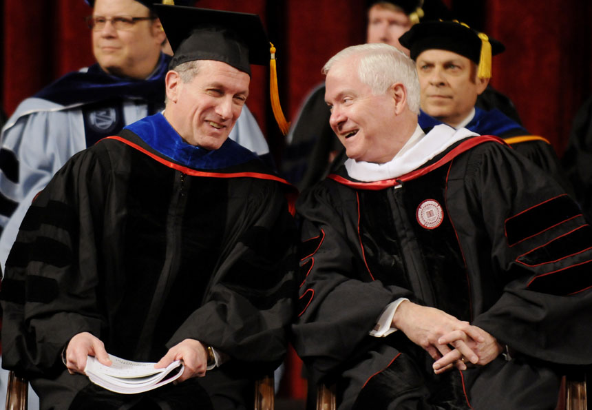 U.S. Secretary of Defense Robert Gates, right, shares a laugh with Bennettt Bertenthal, the dean of the College of Arts and Sciences, on stage during IU's Winter Commencement Exercises on Saturday, Dec. 19, 2009, at Assembly Hall.