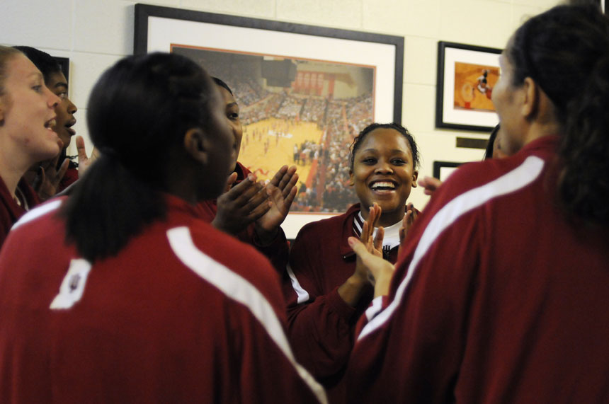 Indiana guard Andrea McGuirt, middle, sings the IU Fight Song along with her teammates before taking the court to warmup before a game against Ohio State on Sunday, Jan. 31, 2010, at Assembly Hall.