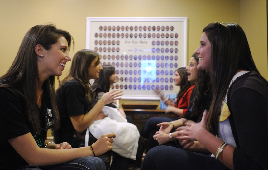 Potential new members, right row, speak with Zeta Tau Alpha sisters, left row, during 14 Party on Thursday, Jan. 7, 2010, at the Zeta Tau Alpha house. The two-day event allows potential new members to meet women from different chapters.