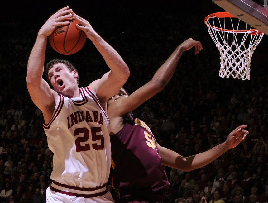 IU forward Tom Pritchard, left, grabs a rebound in front of Minnesota forward/center Ralph Sampson III during a game on Sunday, Jan. 17, 2010, at Assembly Hall.