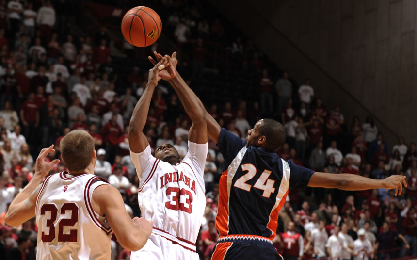 IU guard Devan Dumes (33) tips a pass intended for Illinois forward Mike Davis during a game on Saturday, Jan. 9, 2010, at Assembly Hall.