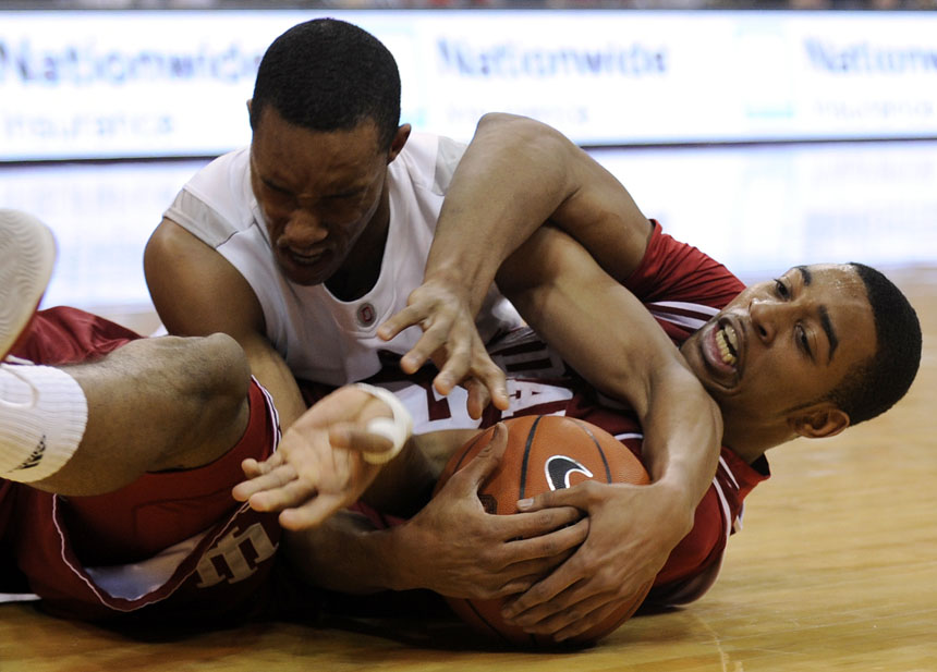 IU forward Christian Watford, right, struggles for a loose ball with Ohio State guard/forward Evan Turner during a game on Wednesday, Jan. 6, 2010, in Columbus, Ohio.