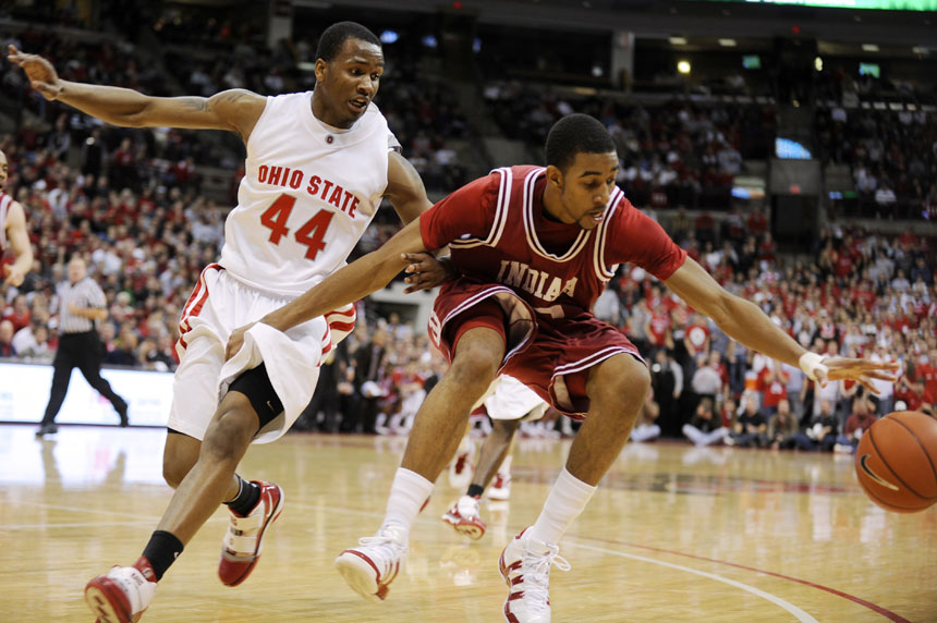 IU forward Christian Watford attempts to grab a loose ball in front of Ohio State guard William Buford during a game on Wednesday, Jan. 6, 2010, in Columbus, Ohio.