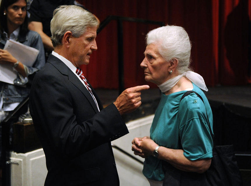 Rose Thomas, right, of Bloomington, listens as Rep. Baron Hill, D-Ind., speaks about health care reform after a town hall meeting on Wednesday, Sept. 2, 2009, at Bloomington High School North. Thomas didn't agree with Hill's position on health care reform.