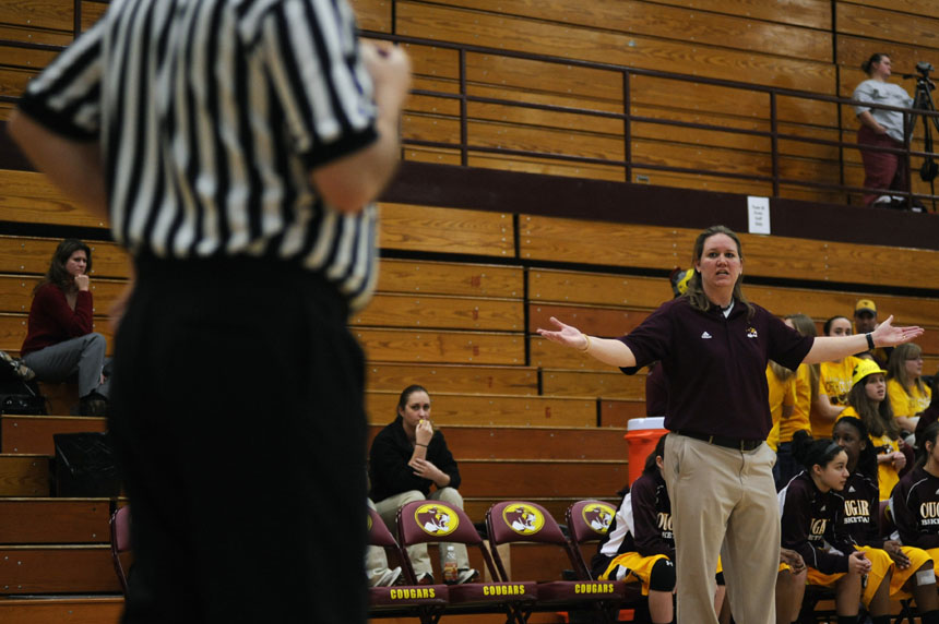 North coach Alana Harrington pleads with an official after a call she didn't agree with during a 4A sectional championship game on Tuesday, Feb. 16, 2010, at Bloomington North. South won 45-32.