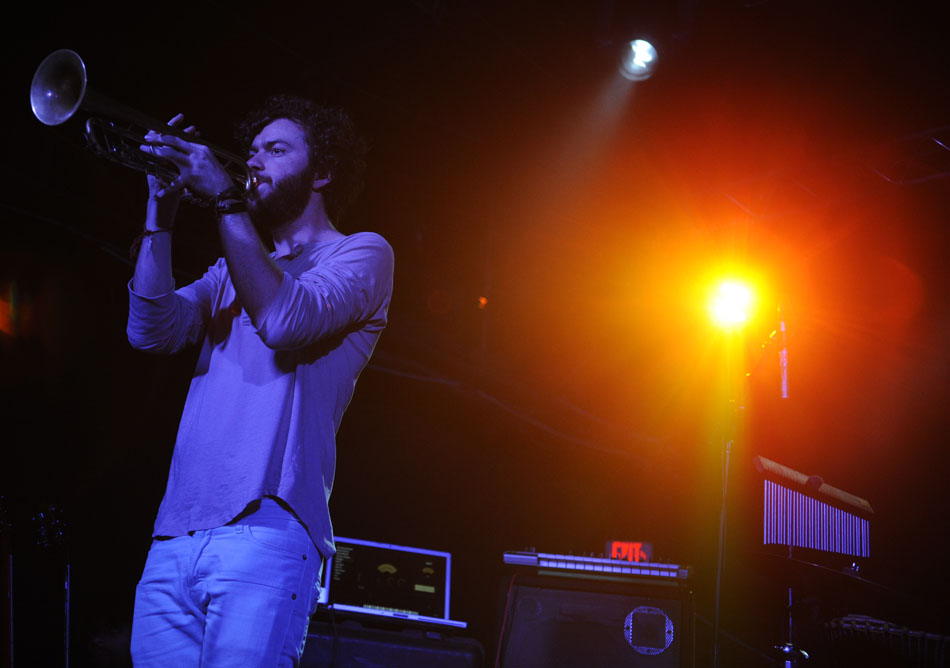 Stewart Cole, of Edward Sharpe and the Magnetic Zeros, plays with the opening act during a performance at La Zona Rosa on Tuesday, July 6, 2010.