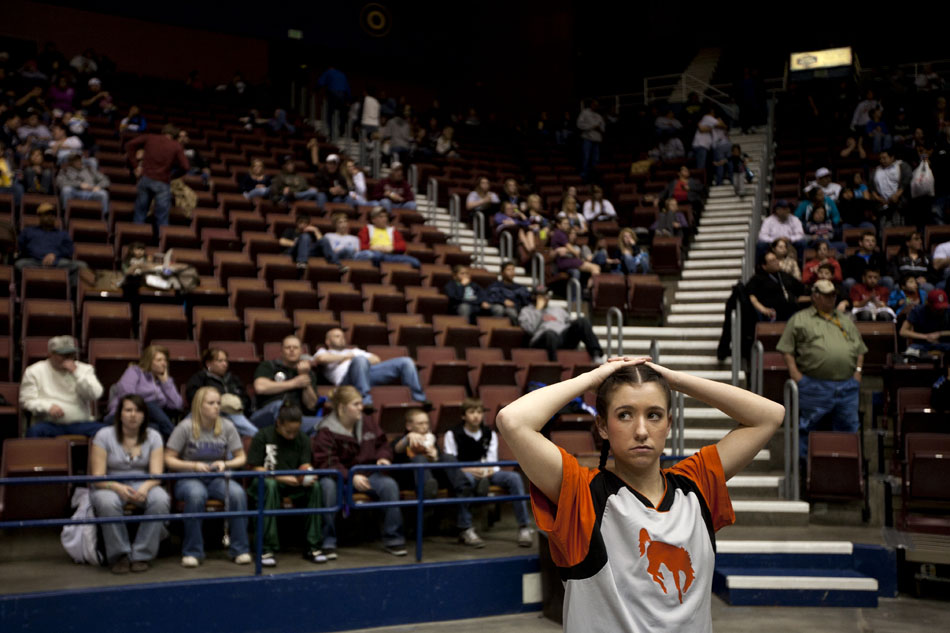 Burns' Alex Ward surveys the arena by herself as she waits to take the court for pre-game warmups before the Class 2A championship game on Saturday, March 5, 2011, in Casper, Wyo.