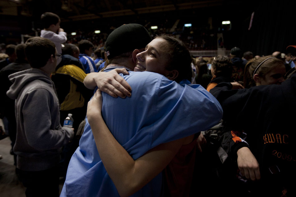 Burns' Alex Ward embraces a friend in tears after a 60-56 loss to Lovell in the Class 2A championship game on Saturday, March 5, 2011, in Casper, Wyo.