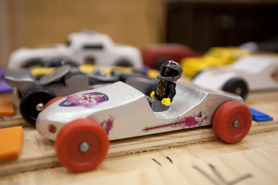 One entry in the pinewood derby featured a driver as seen on Saturday, April 23, 2011, at Storey Gym.