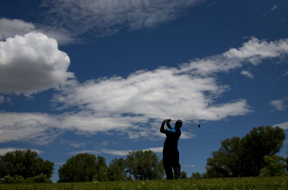 Jeff Keffer watches his tee shot on No. 9, a 156-yard par 3, during the second round of the 55th Tyrrell-Doyle Wyoming Open on Saturday, July 9, 2011, at the Airport Golf Course in Cheyenne, Wyo.